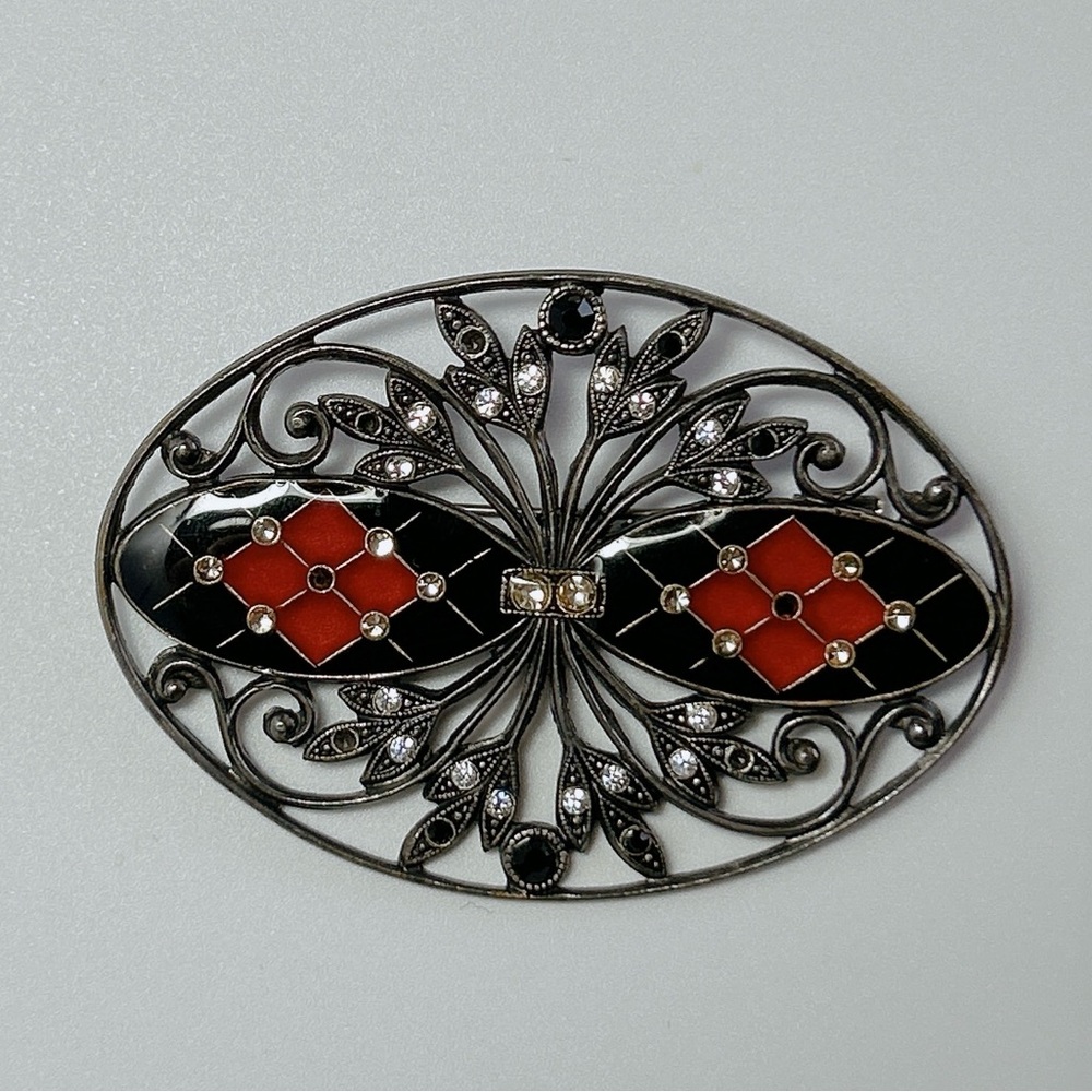 Vintage enamel rhinestone brooch